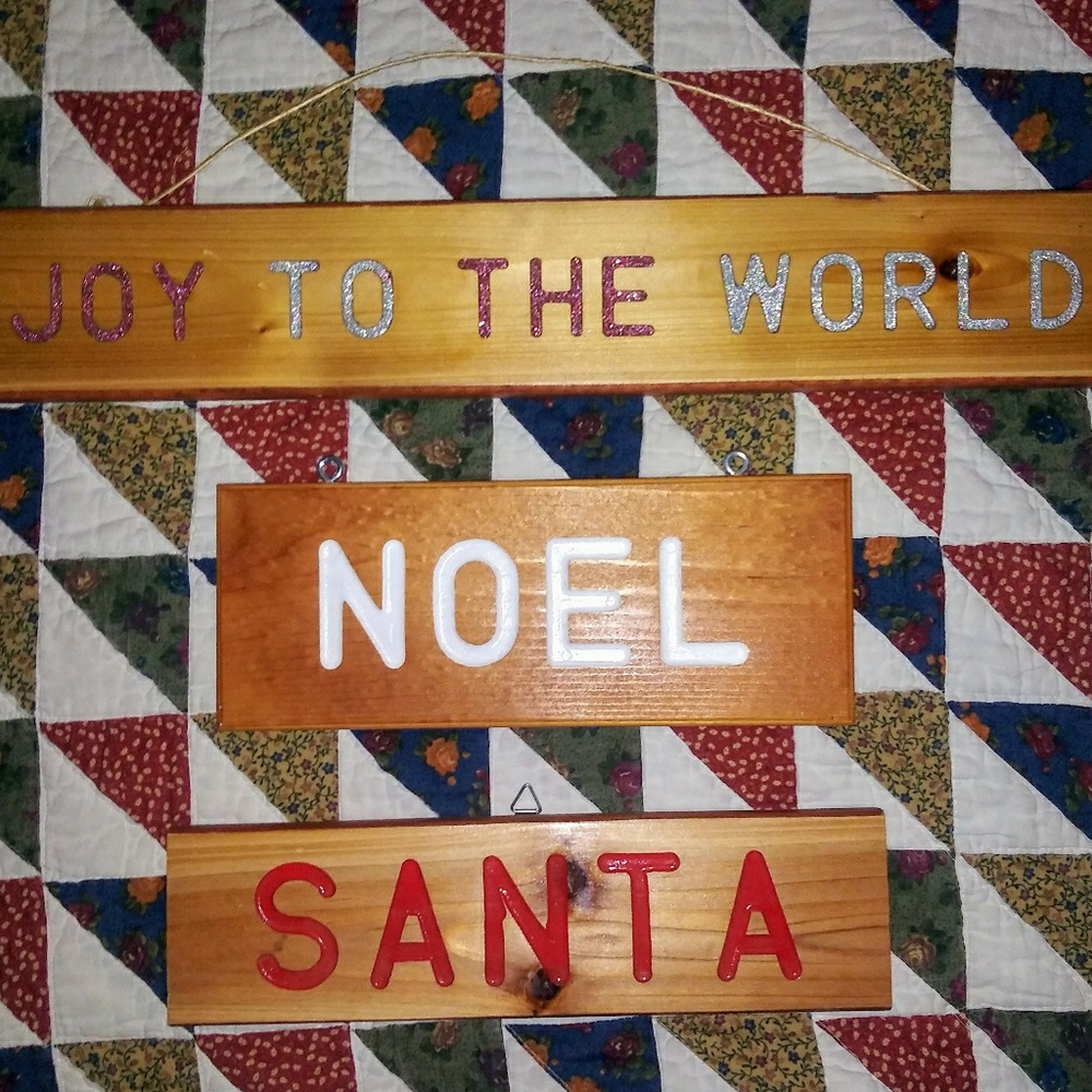 Three Christmas wooden hanging signs